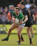 20 March 2022; Jack Savage of Kerry is tackled by Rory Grugan of Armagh during the Allianz Football League Division 1 match between Armagh and Kerry at the Athletic Grounds in Armagh. Photo by Ramsey Cardy/Sportsfile