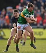 20 March 2022; Jack Savage of Kerry is tackled by Rory Grugan of Armagh during the Allianz Football League Division 1 match between Armagh and Kerry at the Athletic Grounds in Armagh. Photo by Ramsey Cardy/Sportsfile