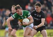 20 March 2022; Jack Savage of Kerry is tackled by Rory Grugan of Armagh during the Allianz Football League Division 1 match between Armagh and Kerry at the Athletic Grounds in Armagh. Photo by Ramsey Cardy/Sportsfile