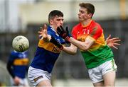 20 March 2022; Dara Curran of Carlow in action against Mark Russell of Tipperary during the Allianz Football League Division 4 match between Tipperary and Carlow at Semple Stadium in Thurles, Tipperary. Photo by Harry Murphy/Sportsfile