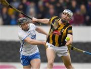 20 March 2022; Huw Lawlor  of Kilkenny is tackled by Colin Dunford of Waterford during the Allianz Hurling League Division 1 Group B match between Kilkenny and Waterford at UMPC Nowlan Park in Kilkenny. Photo by Ray McManus/Sportsfile