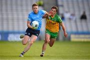 20 March 2022; Robert McDaid of Dublin in action against Peader Mogan of Donegal during the Allianz Football League Division 1 match between Dublin and Donegal at Croke Park in Dublin. Photo by Stephen McCarthy/Sportsfile