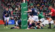 20 March 2022; Jack Boyle of Ireland , hidden, scores his side's first try during the U20 Six Nations Rugby Championship match between Ireland and Scotland at Musgrave Park in Cork. Photo by Brendan Moran/Sportsfile