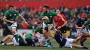 20 March 2022; Ben Carson of Ireland is tackled by Duncan Munn of Scotland during the U20 Six Nations Rugby Championship match between Ireland and Scotland at Musgrave Park in Cork. Photo by Brendan Moran/Sportsfile