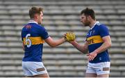 20 March 2022; Colm O'Shaughnessy and Jimmy Feehan of Tipperary embrace after their side's victory in the Allianz Football League Division 4 match between Tipperary and Carlow at Semple Stadium in Thurles, Tipperary. Photo by Harry Murphy/Sportsfile