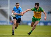 20 March 2022; Cormac Costello of Dublin in action against Brendan McCole of Donegal during the Allianz Football League Division 1 match between Dublin and Donegal at Croke Park in Dublin. Photo by Stephen McCarthy/Sportsfile