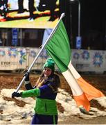 20 March 2022; Flagbearer Megan Ryan during the opening ceremony ahead of day one of the 2022 European Youth Winter Olympic Festival in Vuokatti, Finland. Photo by Eóin Noonan/Sportsfile