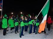 20 March 2022; Flagbearer Megan Ryan leads Team Ireland in the opening ceremony ahead of day one of the 2022 European Youth Winter Olympic Festival in Vuokatti, Finland. Photo by Eóin Noonan/Sportsfile