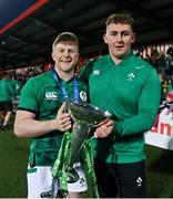 20 March 2022; Ireland players Patrick Campbell, left, and Daragh McSweeney celebrate with the U20 Six Nations championship trophy after the U20 Six Nations Rugby Championship match between Ireland and Scotland at Musgrave Park in Cork. Photo by Brendan Moran/Sportsfile