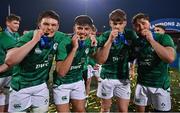 20 March 2022; Ireland players, from left, Lorcan McLoughlin, Chay Mullins, Jude Postlethwaite and Ben Carson celebrate with their medals after the U20 Six Nations Rugby Championship match between Ireland and Scotland at Musgrave Park in Cork. Photo by Brendan Moran/Sportsfile