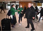 21 March 2022; Ireland's Phil Healy is geeted by Athletics Ireland president John Cronin at Dublin Airport on the team's return from the World Indoor Athletics Championship in Serbia. Photo by Stephen McCarthy/Sportsfile