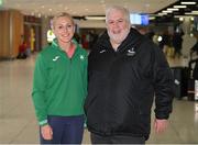 21 March 2022; Ireland's Sarah Lavin, who finished seventh in the final of the 60m hurdles, is geeted by Athletics Ireland president John Cronin at Dublin Airport on the team's return from the World Indoor Athletics Championship in Serbia. Photo by Stephen McCarthy/Sportsfile