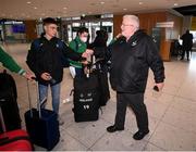 21 March 2022; Ireland's Darragh McElhinney is geeted by Athletics Ireland president John Cronin at Dublin Airport on the team's return from the World Indoor Athletics Championship in Serbia. Photo by Stephen McCarthy/Sportsfile