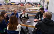 21 March 2022; Team Ireland athletes, from left, Megan Ryan, Charlotte Turner and Elizabeth Golding speaking to EYOF reporters Padraig Faherty and Darragh Lyons during day two of the 2022 European Youth Winter Olympic Festival in Vuokatti, Finland. Photo by Eóin Noonan/Sportsfile