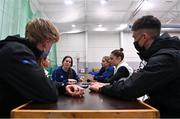 21 March 2022; Team Ireland athletes, from left, Megan Ryan, Charlotte Turner, Elizabeth Golding and Kailey Murphy speaking to EYOF reporters Padraig Faherty and Darragh Lyons during day two of the 2022 European Youth Winter Olympic Festival in Vuokatti, Finland. Photo by Eóin Noonan/Sportsfile