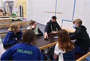 21 March 2022; Team Ireland athletes, from left, Charlotte Turner, Megan Ryan, Elizabeth Golding and Kailey Murphy speaking to EYOF reporters Padraig Faherty and Darragh Lyons during day two of the 2022 European Youth Winter Olympic Festival in Vuokatti, Finland. Photo by Eóin Noonan/Sportsfile