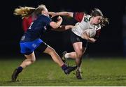 21 March 2022; Caoimhe McCormack of Midlands is tackled by Imogen Hauer of Metro during the Bank of Ireland Leinster Rugby U18 Sarah Robinson Cup 4th round match between Midlands and Metro at Maynooth University in Maynooth, Kildare. Photo by Piaras Ó Mídheach/Sportsfile