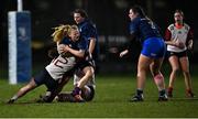 21 March 2022; Imogen Hauer of Metro is tackled by Caoimhe McCormack, left, and Hannah Kennedy of Midlands during the Bank of Ireland Leinster Rugby U18 Sarah Robinson Cup 4th round match between Midlands and Metro at Maynooth University in Maynooth, Kildare. Photo by Piaras Ó Mídheach/Sportsfile