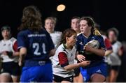 21 March 2022; Sinead Kinsella of Metro is tackled by Hannah Connon of Midlands during the Bank of Ireland Leinster Rugby U18 Sarah Robinson Cup 4th round match between Midlands and Metro at Maynooth University in Maynooth, Kildare. Photo by Piaras Ó Mídheach/Sportsfile