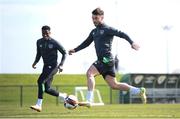 22 March 2022; Scott Hogan and Chiedozie Ogbene, left, during a Republic of Ireland training session at the FAI National Training Centre in Abbotstown, Dublin. Photo by Stephen McCarthy/Sportsfile