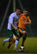 22 March 2022; Darragh Burns of Republic of Ireland U20's in action against Luke Casey of Republic of Ireland Amateur Selection during the friendly match between Republic of Ireland U20's and Republic of Ireland Amateur Selection at Home Farm FC in Dublin. Photo by Harry Murphy/Sportsfile