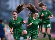 23 March 2022; Republic of Ireland players Aoibhe Fleming, left, and Lia O'Leary during the warm-up before UEFA EURO2022 Women's Under-17 Round 2 qualifying match between Republic of Ireland and Slovakia at Tallaght Stadium in Dublin. Photo by Piaras Ó Mídheach/Sportsfile