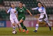 23 March 2022; Lia O'Leary of Republic of Ireland gets away from Sára Straková, left, and Linda Hlavinková of Slovakia during the UEFA EURO2022 Women's Under-17 Round 2 qualifying match between Republic of Ireland and Slovakia at Tallaght Stadium in Dublin. Photo by Piaras Ó Mídheach/Sportsfile
