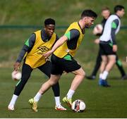 24 March 2022; Scott Hogan and Chiedozie Ogbene, left, during a Republic of Ireland training session at the FAI National Training Centre in Abbotstown, Dublin. Photo by Stephen McCarthy/Sportsfile