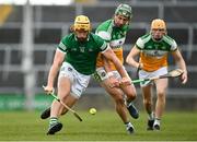 20 March 2022; Tom Morrissey of Limerick in action against David King of Offaly during the Allianz Hurling League Division 1 Group A match between Limerick and Offaly at TUS Gaelic Grounds in Limerick. Photo by Seb Daly/Sportsfile
