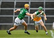 20 March 2022; John Murphy of Offaly in action against Tom Morrissey of Limerick during the Allianz Hurling League Division 1 Group A match between Limerick and Offaly at TUS Gaelic Grounds in Limerick. Photo by Seb Daly/Sportsfile