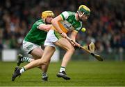 20 March 2022; Jack Screeney of Offaly in action against Oisín O’Reilly of Limerick during the Allianz Hurling League Division 1 Group A match between Limerick and Offaly at TUS Gaelic Grounds in Limerick. Photo by Seb Daly/Sportsfile