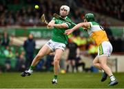 20 March 2022; Aaron Gillane of Limerick in action against David King of Offaly during the Allianz Hurling League Division 1 Group A match between Limerick and Offaly at TUS Gaelic Grounds in Limerick. Photo by Seb Daly/Sportsfile