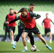 25 March 2022; Jeff Hendrick is tackled by Matt Doherty during a Republic of Ireland training session at Aviva Stadium in Dublin. Photo by Stephen McCarthy/Sportsfile