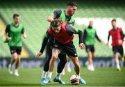25 March 2022; Jeff Hendrick is tackled by Matt Doherty during a Republic of Ireland training session at Aviva Stadium in Dublin. Photo by Stephen McCarthy/Sportsfile