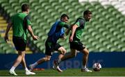 25 March 2022; Jayson Molumby, right, in action against Jason Knight during a Republic of Ireland training session at Aviva Stadium in Dublin. Photo by Stephen McCarthy/Sportsfile