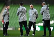 25 March 2022; Belgium manager Roberto Martinez, third from left, with assistant coaches, from left, Anthony Barry, Thomas Vermaelen and theirry Henry during a Belgium training session at the Aviva Stadium in Dublin. Photo by Seb Daly/Sportsfile