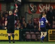 25 March 2022; Referee David Dunne gives Aaron Connolly of Athlone Town a red card during the SSE Airtricity League First Division match between Cork City and Athlone Town at Turners Cross in Cork. Photo by Michael P Ryan/Sportsfile