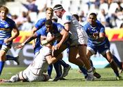 26 March 2022; Damian Willemse of DHL Stormers is tackled by Marcus Rea, left, and Rob Herring of Ulster during the United Rugby Championship match between DHL Stormers and Ulster at Cape Town Stadium in Cape Town, South Africa. Photo by Ashley Vlotman/Sportsfile