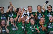 26 March 2022; Mercy Mounthawk joint captains Katie Nix and Róisín Rahilly lift the cup after the Lidl All Ireland Post Primary School Junior ‘C’ Championship Final match between Mercy Mounthawk, Kerry and Maynooth Education Campus, Kildare at Duggan Park in Ballinasloe, Galway. Photo by Ray Ryan/Sportsfile