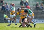 26 March 2022; Domhnall Nugent of Antrim in action against Leon Fox, left, and Jason Sampson of Offaly during the Allianz Hurling League Division 1 Relegation Play-off match between Antrim and Offaly at Páirc Tailteann in Navan, Meath. Photo by Daire Brennan/Sportsfile