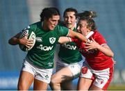 26 March 2022; Amee-Leigh Murphy Crowe of Ireland evades the tackle from Elinor Snowsill of Wales on his way to scoring her side's first try during the TikTok Women's Six Nations Rugby Championship match between Ireland and Wales at RDS Arena in Dublin. Photo by David Fitzgerald/Sportsfile
