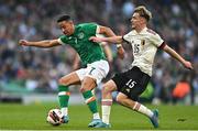 26 March 2022; Callum Robinson of Republic of Ireland in action against Alexis Saelemaekers of Belgium during the international friendly match between Republic of Ireland and Belgium at the Aviva Stadium in Dublin. Photo by Eóin Noonan/Sportsfile