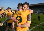 26 March 2022; Injured Antrim player Neil McManus celebrates with team-mate Keelan Molloy after the Allianz Hurling League Division 1 Relegation Play-off match between Antrim and Offaly at Páirc Tailteann in Navan, Meath. Photo by Daire Brennan/Sportsfile