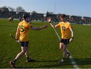 26 March 2022; Ciarán Clarke, left, and James McNaughton of Antrim celebrate after the Allianz Hurling League Division 1 Relegation Play-off match between Antrim and Offaly at Páirc Tailteann in Navan, Meath. Photo by Daire Brennan/Sportsfile