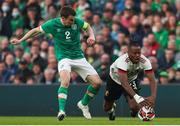 26 March 2022; Michy Batshuayi of Belgium in action against Seamus Coleman of Republic of Ireland during the international friendly match between Republic of Ireland and Belgium at the Aviva Stadium in Dublin. Photo by Michael P Ryan/Sportsfile