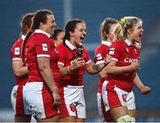 26 March 2022; Ffion Lewis, centre, and Alex Callender of Wales celebrate after the TikTok Women's Six Nations Rugby Championship match between Ireland and Wales at RDS Arena in Dublin. Photo by David Fitzgerald/Sportsfile