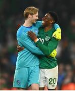 26 March 2022; Republic of Ireland goalkeeper Caoimhin Kelleher, left, and Chiedozie Ogbene of Republic of Ireland after the international friendly match between Republic of Ireland and Belgium at the Aviva Stadium in Dublin. Photo by Eóin Noonan/Sportsfile
