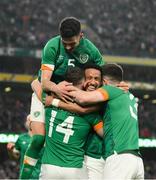 26 March 2022; Alan Browne of Republic of Ireland, 14, celebrates with teammates John Egan, Callum Robinson and Ryan Manning, after scoring his side's second goal during the international friendly match between Republic of Ireland and Belgium at the Aviva Stadium in Dublin. Photo by Stephen McCarthy/Sportsfile