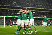 26 March 2022; Alan Browne of Republic of Ireland, 14, celebrates with teammates after scoring his side's second goal during the international friendly match between Republic of Ireland and Belgium at the Aviva Stadium in Dublin. Photo by Stephen McCarthy/Sportsfile