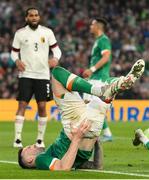 26 March 2022; Shane Duffy of Republic of Ireland reacts after a collision with Thorgan Hazard of Belgium during the international friendly match between Republic of Ireland and Belgium at the Aviva Stadium in Dublin. Photo by Stephen McCarthy/Sportsfile